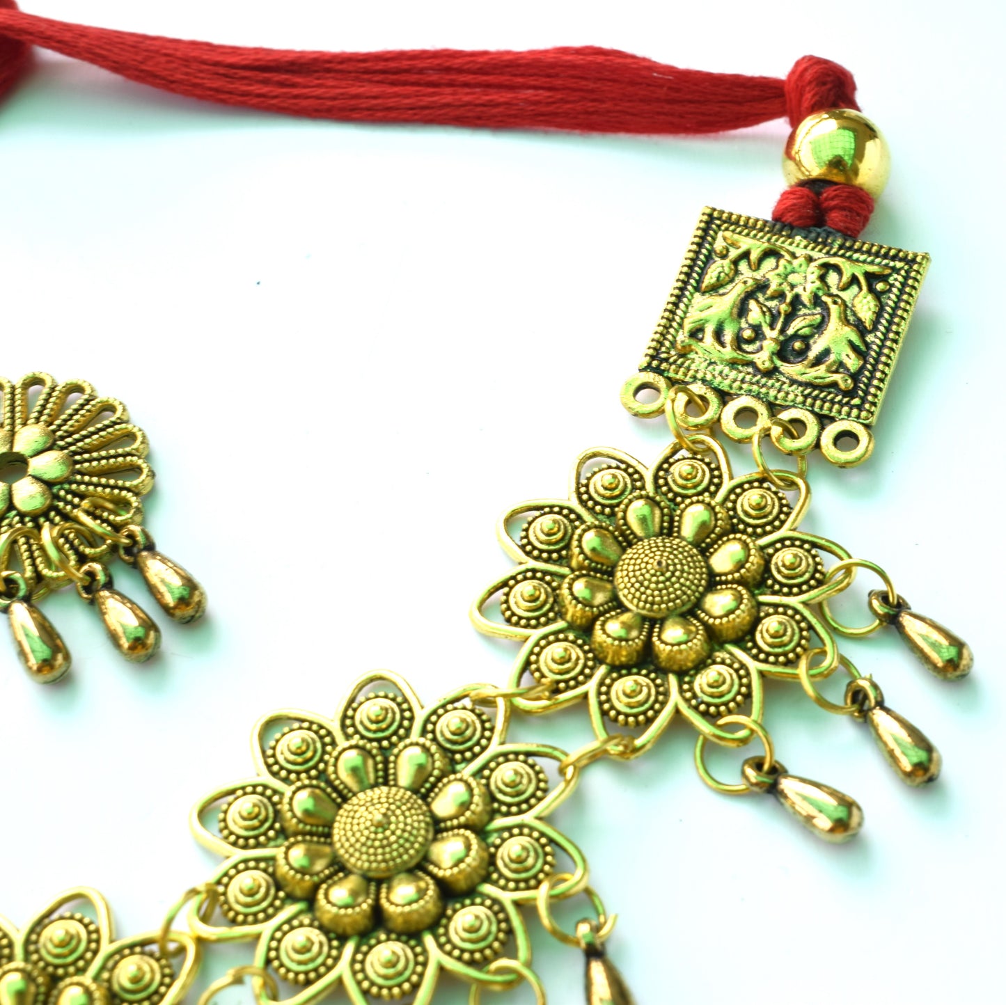Golden Oxidised Soorajmukhi Choker Necklace with Earrings