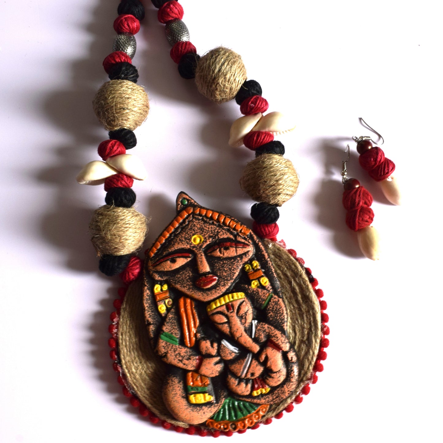 Terracotta Gauri Putra Ganesh Pendant Jute Necklace with Sea Shell Earrings