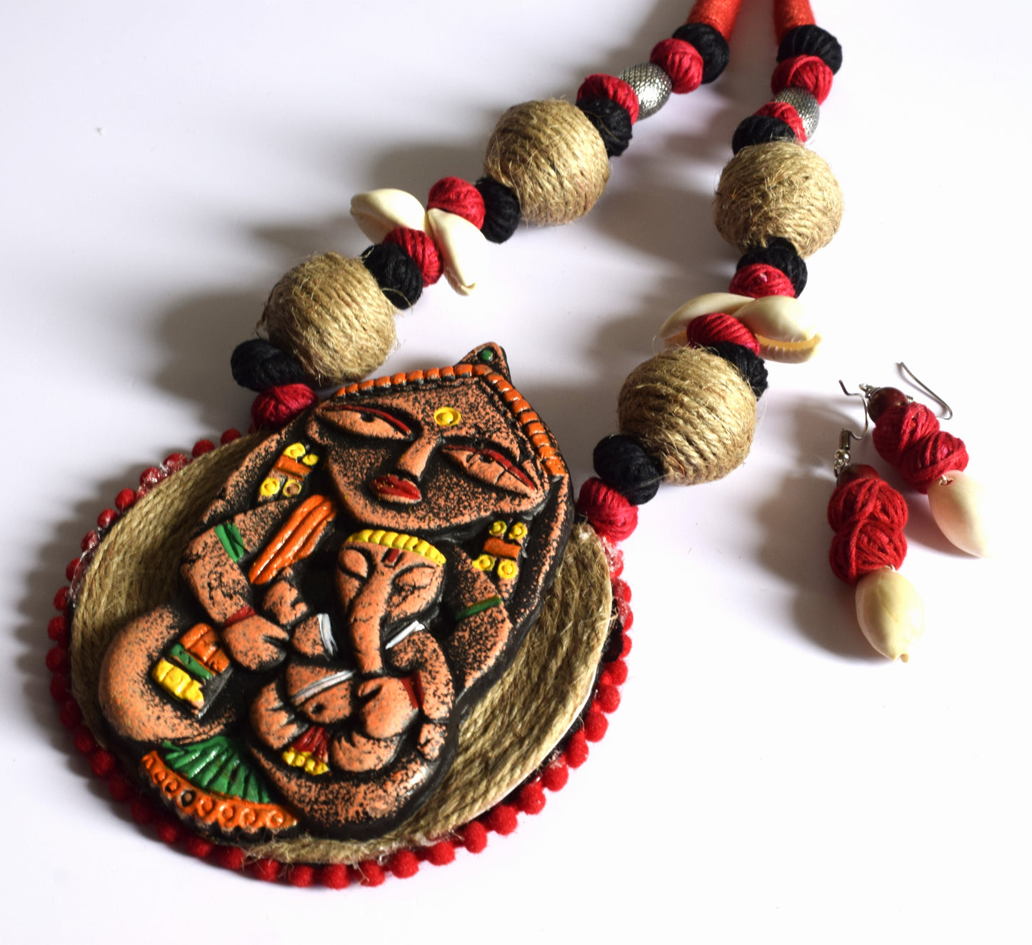 Terracotta Gauri Putra Ganesh Pendant Jute Necklace with Sea Shell Earrings