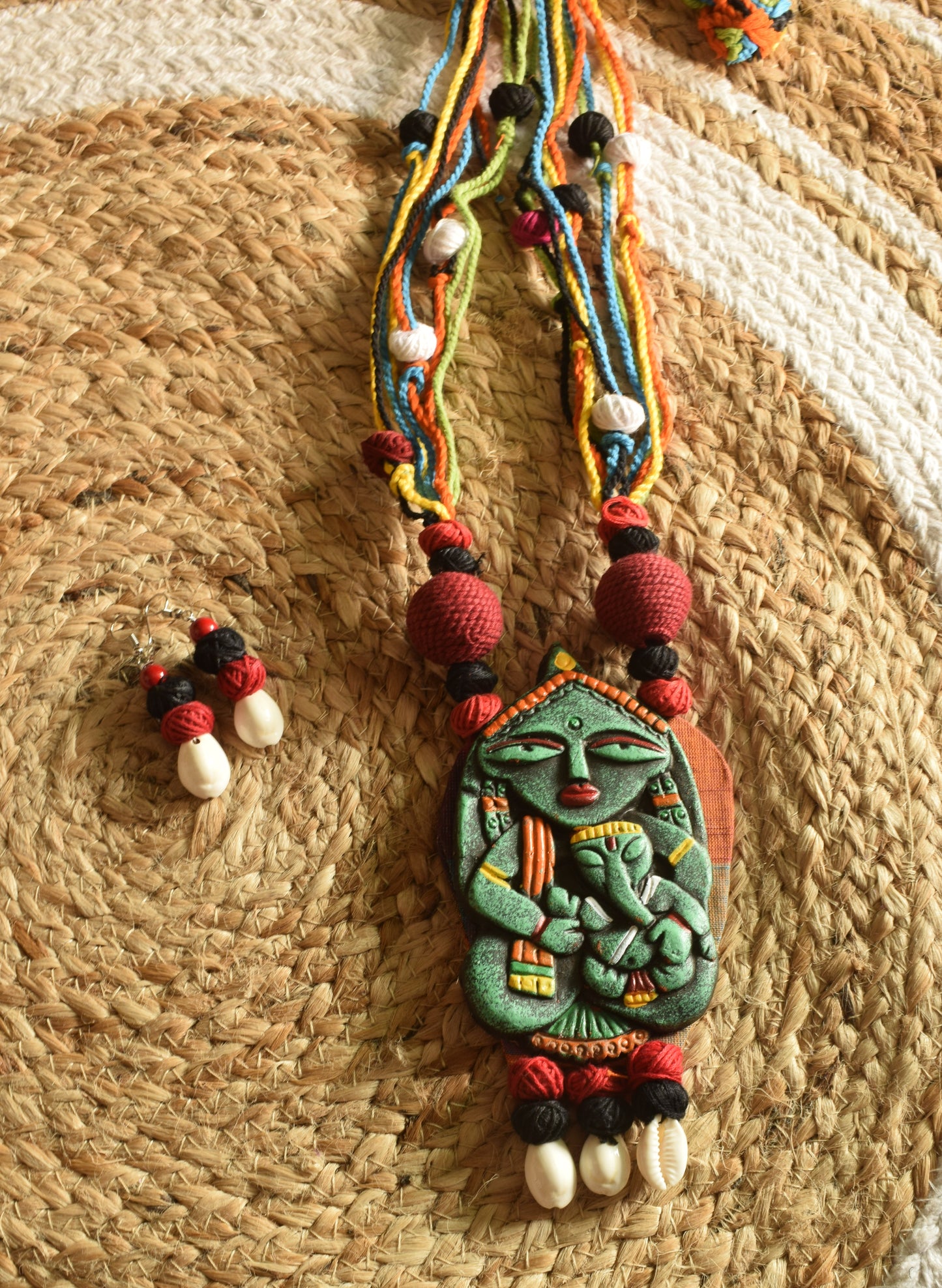Terracotta Gauri Putra Ganesh Pendant Jute Necklace with Sea Shell Earrings