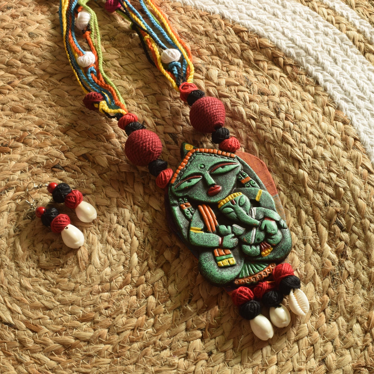 Terracotta Gauri Putra Ganesh Pendant Jute Necklace with Sea Shell Earrings