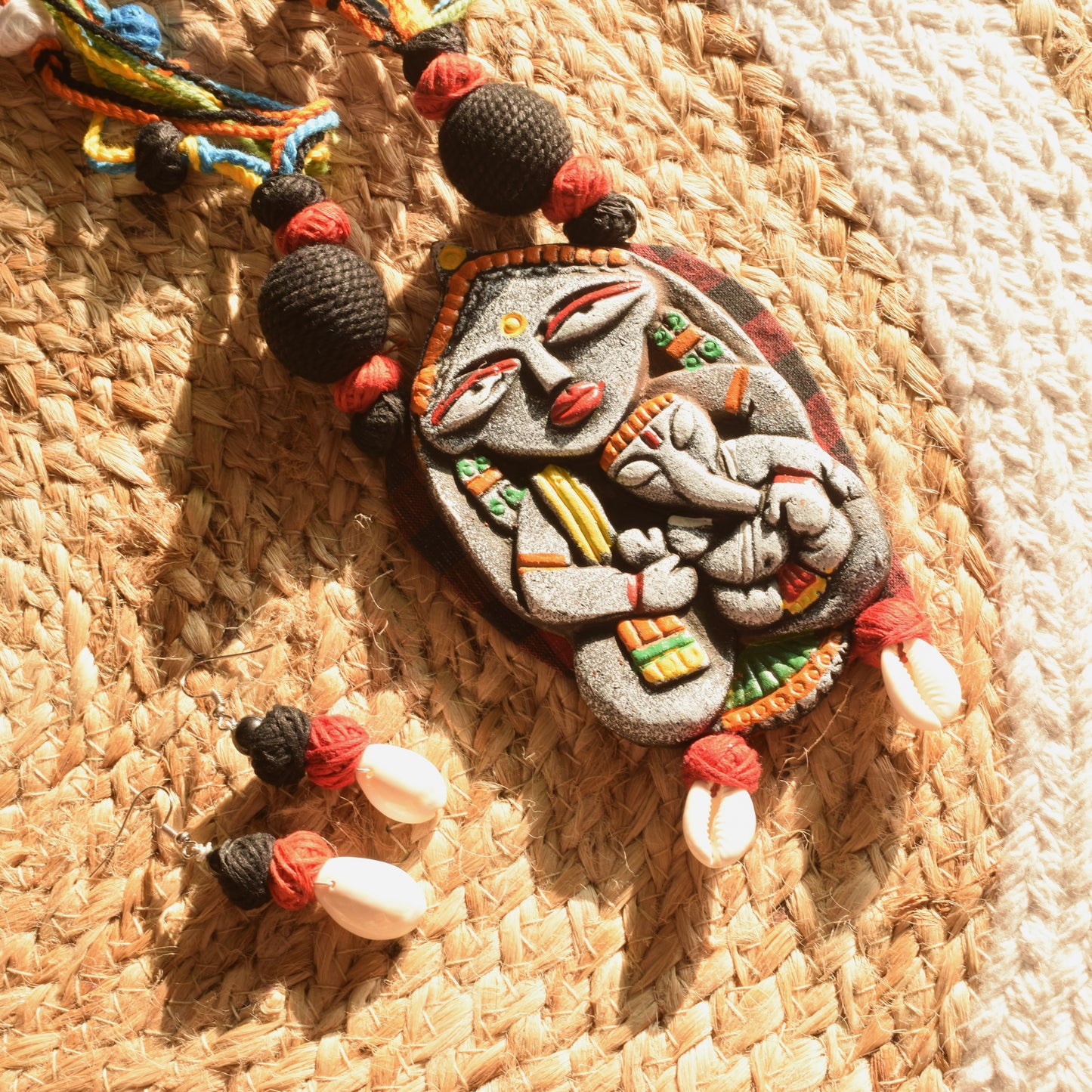 Terracotta Gauri Putra Ganesh Pendant Jute Necklace with Sea Shell Earrings