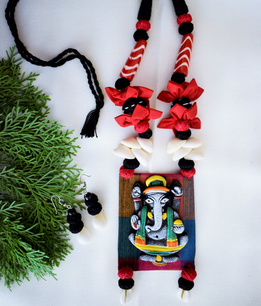 Terracotta Ganesh Pendant Fabric Necklace with Sea Shell Earrings