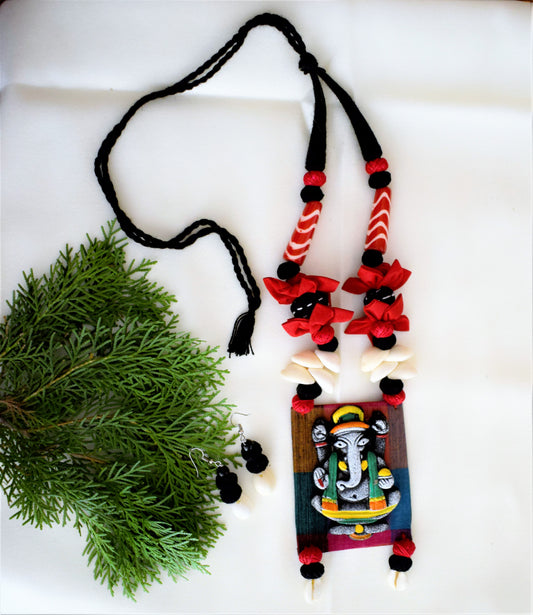 Terracotta Ganesh Pendant Fabric Necklace with Sea Shell Earrings