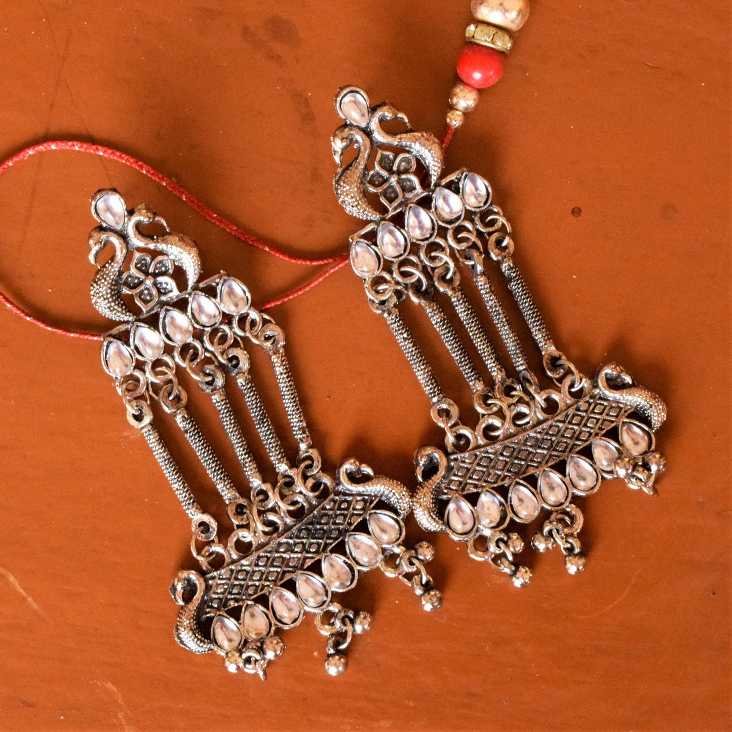 German Silver Pushpak Earrings