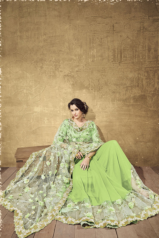 Graceful Pastel Green Tissue Saree with Latest Floral Design - GlitterGleam