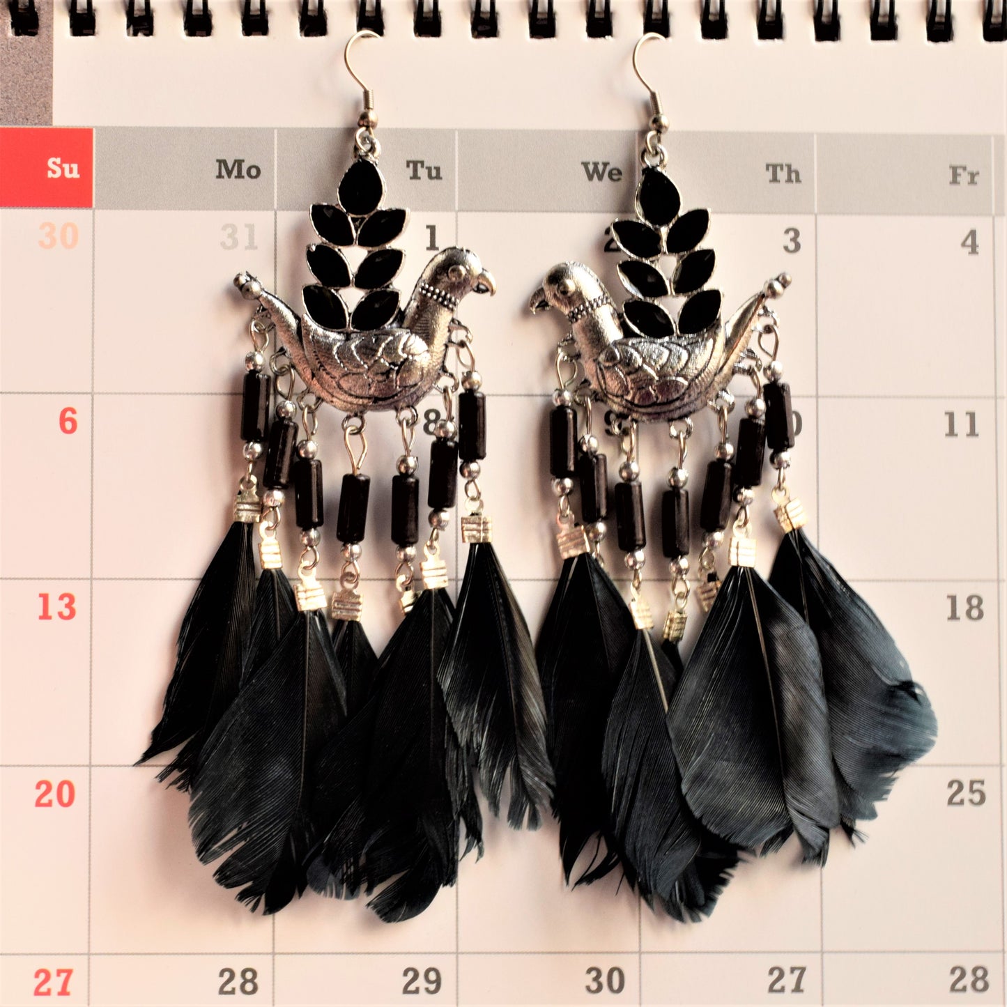Black Afghani Bird Feather Earrings