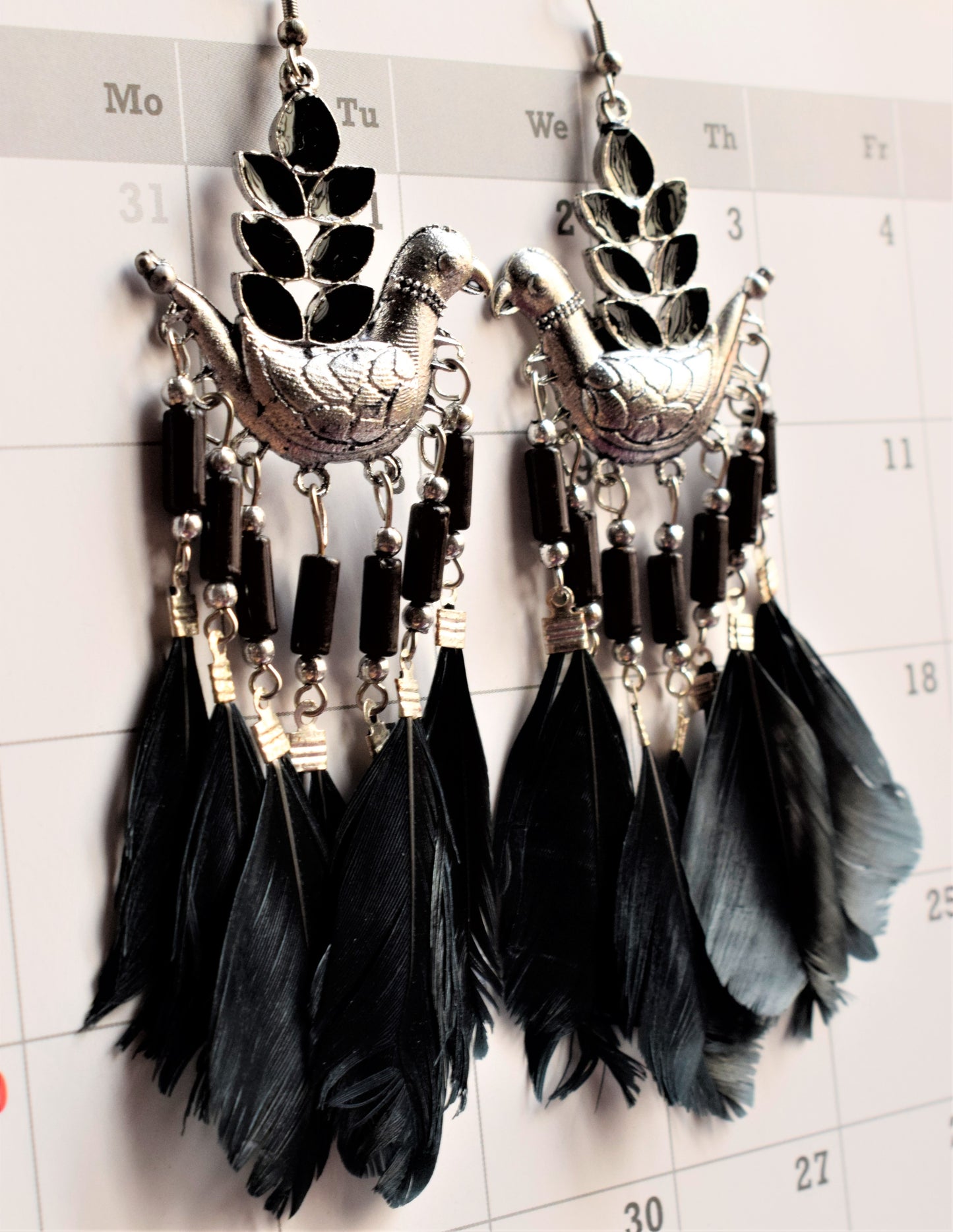 Black Afghani Bird Feather Earrings