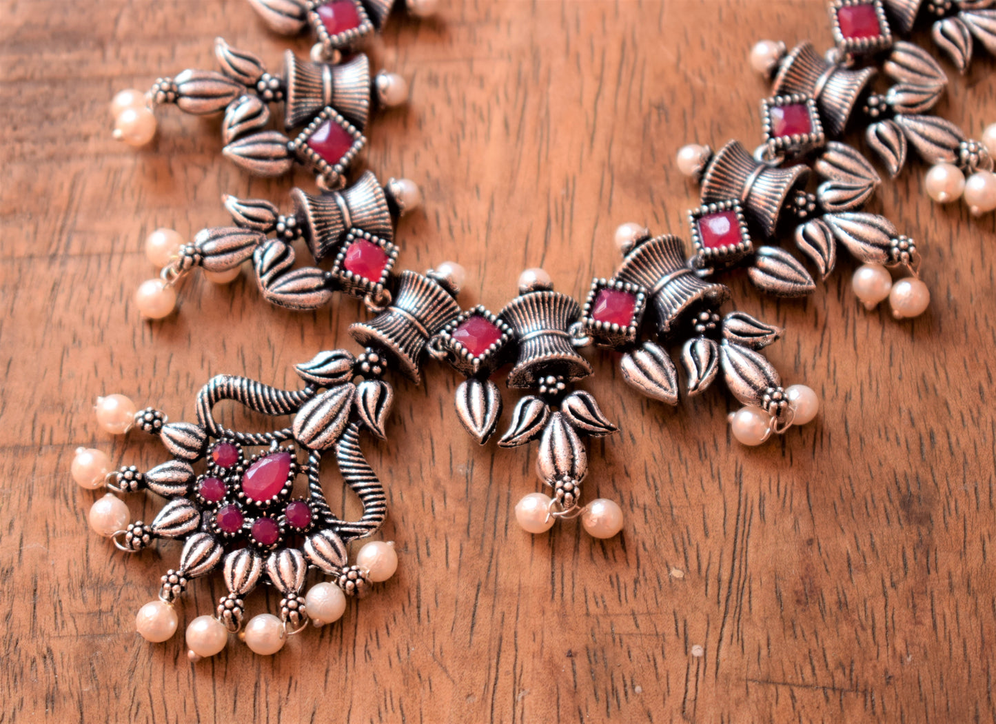 Designer Silver Necklace Set with Ruby and Pearl Embellishments