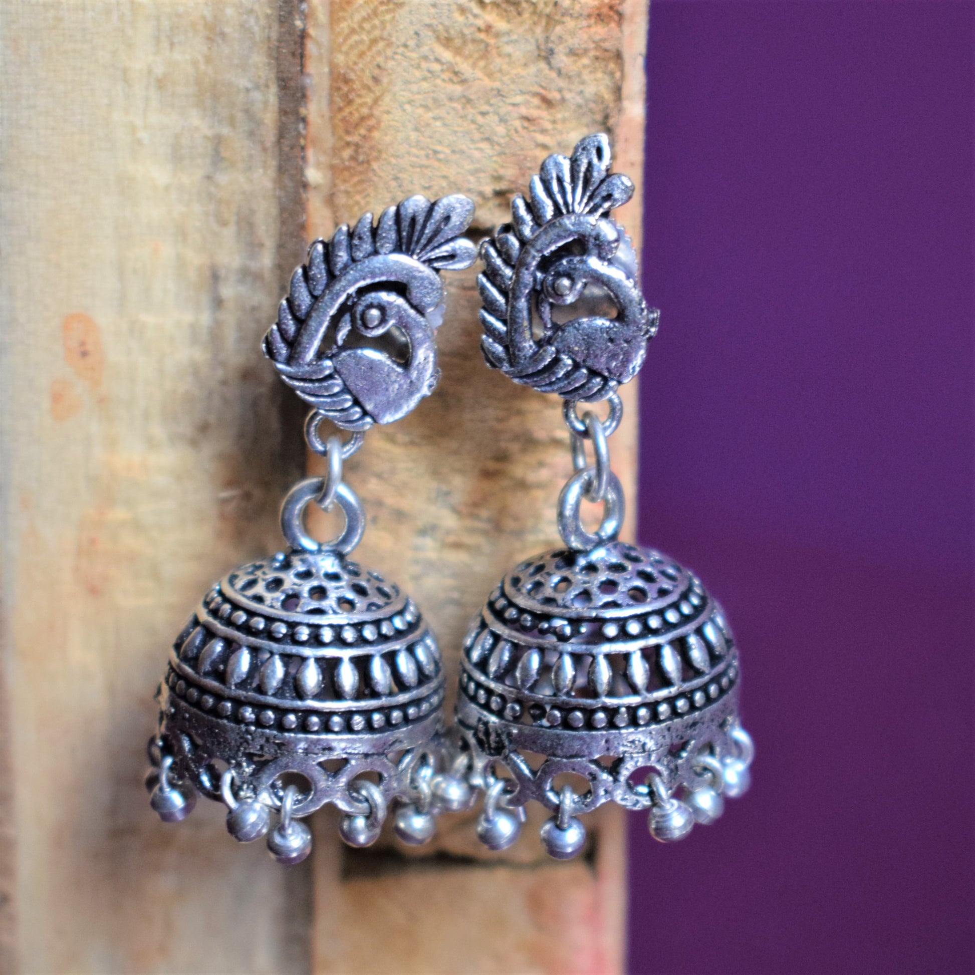 Small Winged Peacock German Silver Jhumka - GlitterGleam