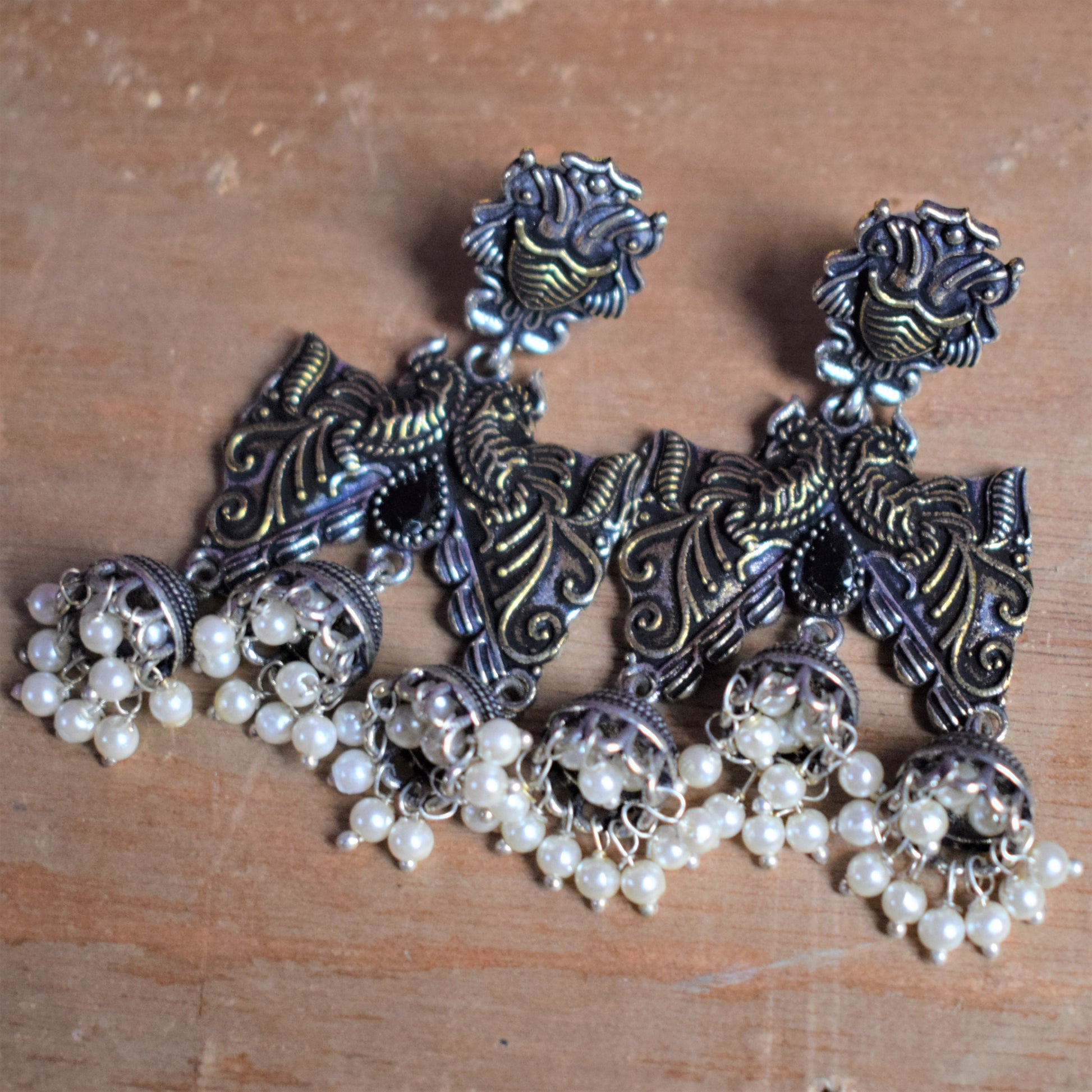 Designer Dual Tone Peacock Cutwork Earring - GlitterGleam