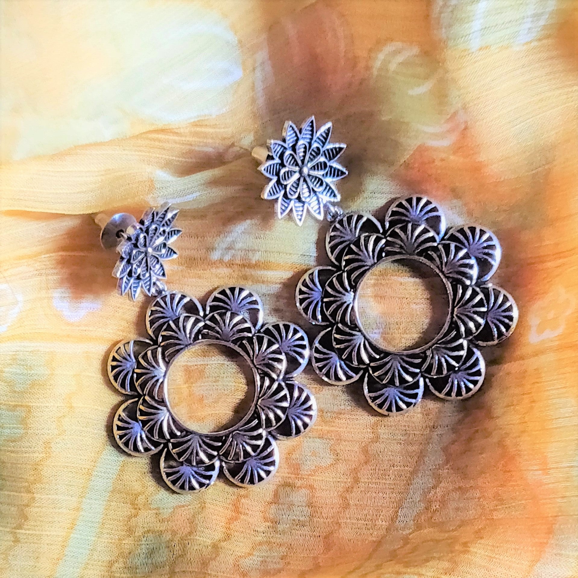 Designer German Silver Floral Carved Hanging Earrings - GlitterGleam