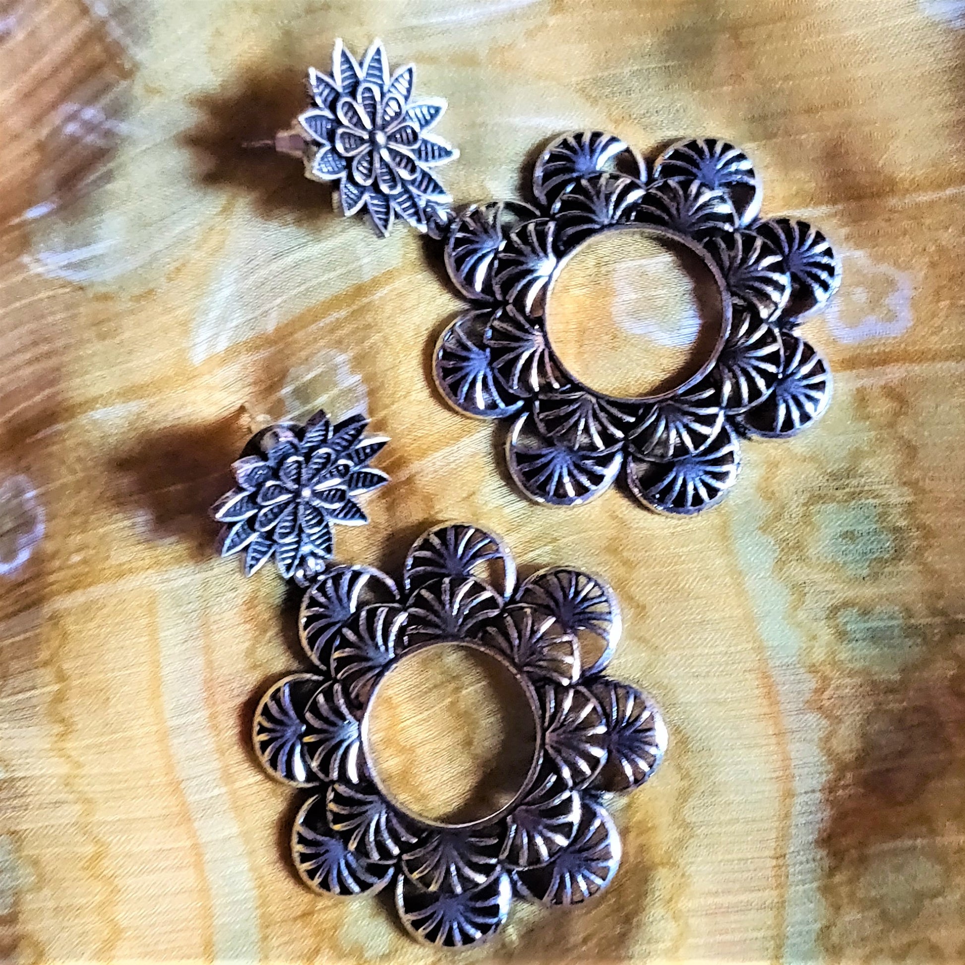 Designer German Silver Floral Carved Hanging Earrings - GlitterGleam