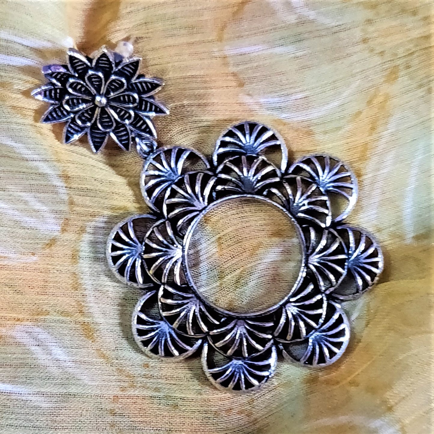 Designer German Silver Floral Carved Hanging Earrings - GlitterGleam