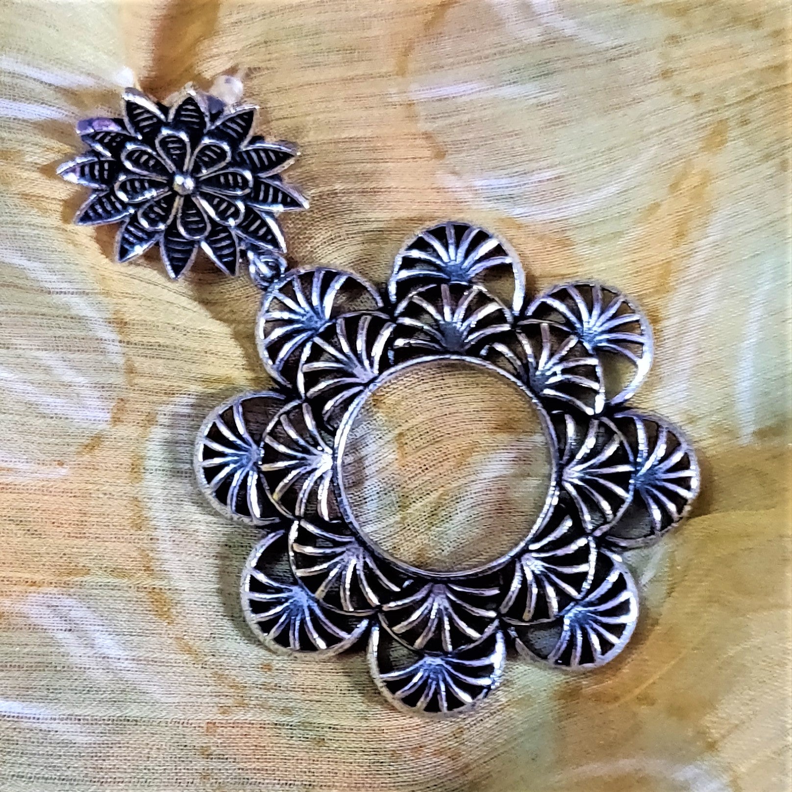 Designer German Silver Floral Carved Hanging Earrings - GlitterGleam