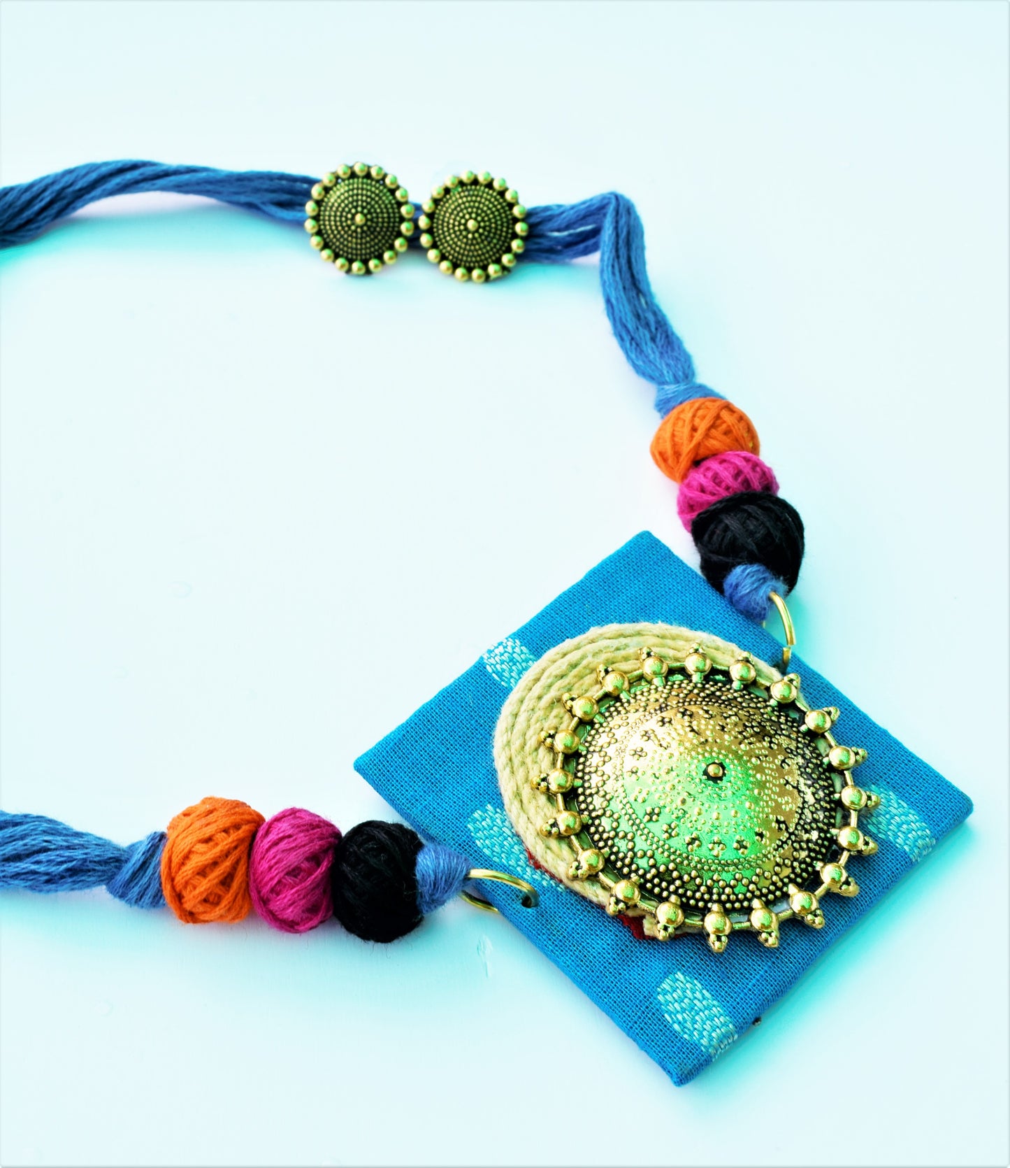 Golden Oxidised Chandra Jute and Sky Blue Fabric Necklace Set
