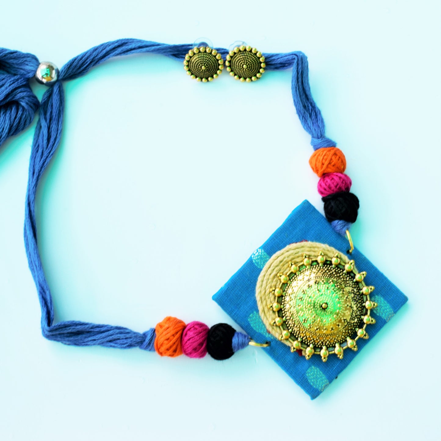 Golden Oxidised Chandra Jute and Sky Blue Fabric Necklace Set