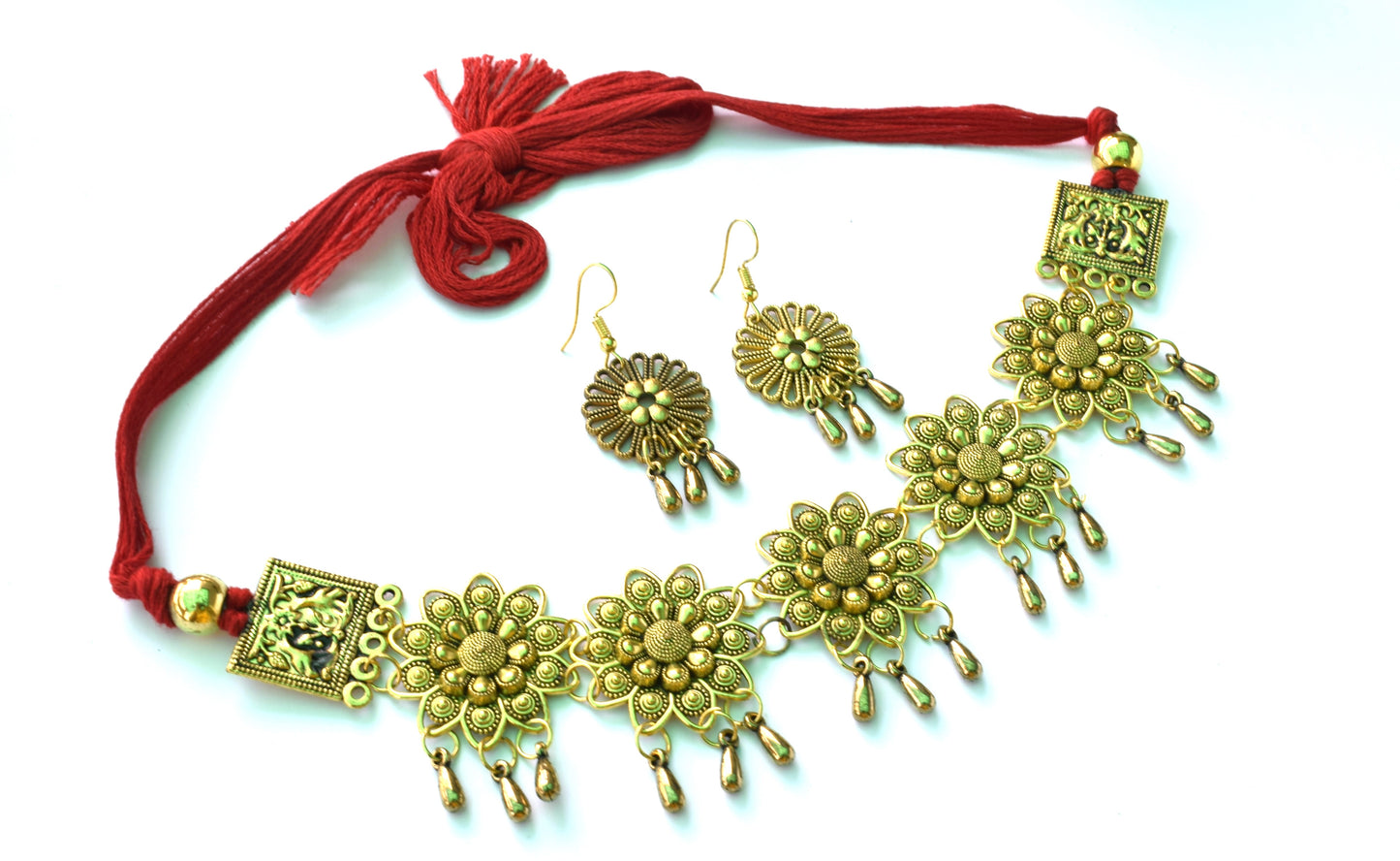 Golden Oxidised Soorajmukhi Choker Necklace with Earrings