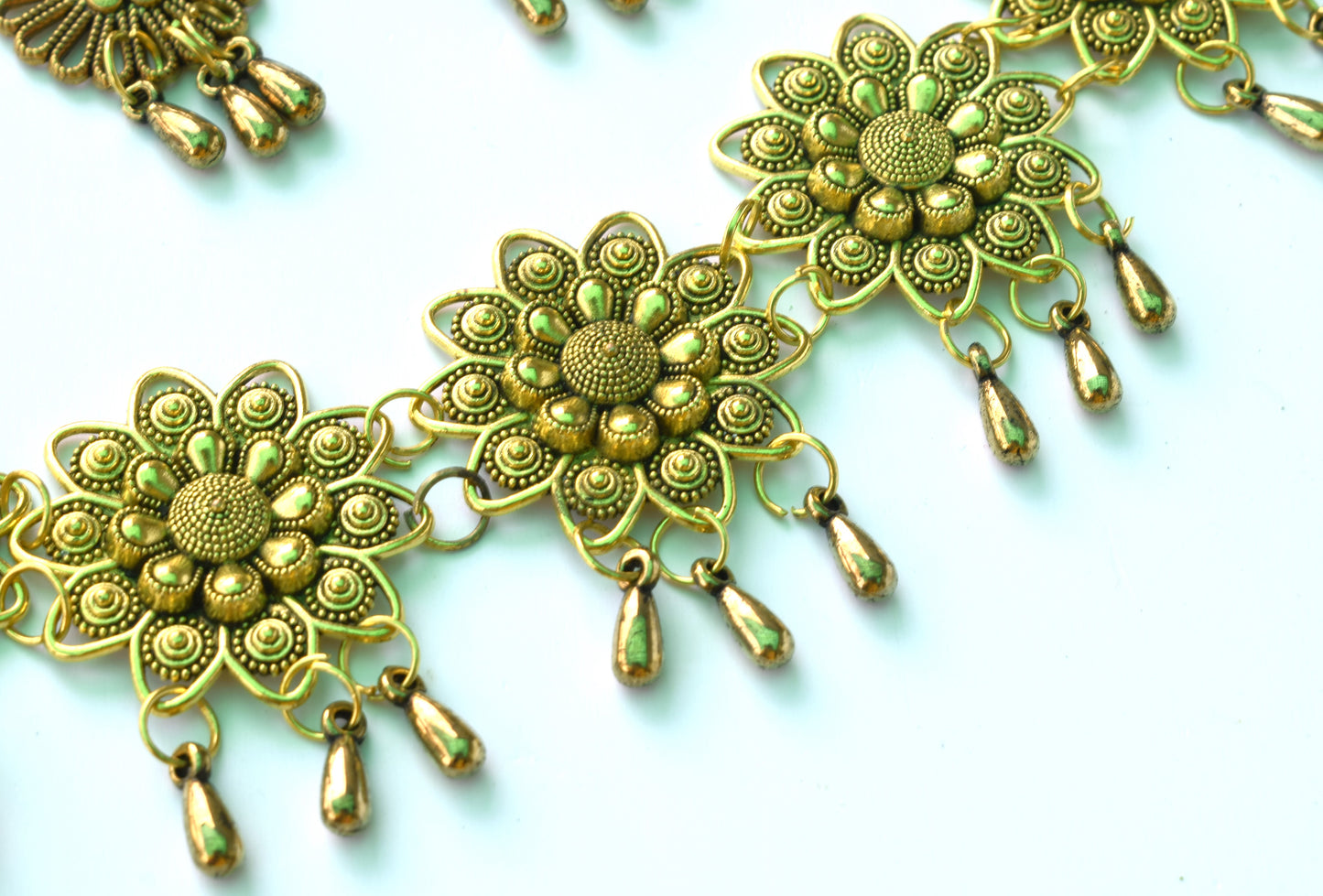 Golden Oxidised Soorajmukhi Choker Necklace with Earrings
