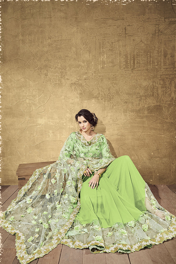 Graceful Pastel Green Tissue Saree with Latest Floral Design - GlitterGleam