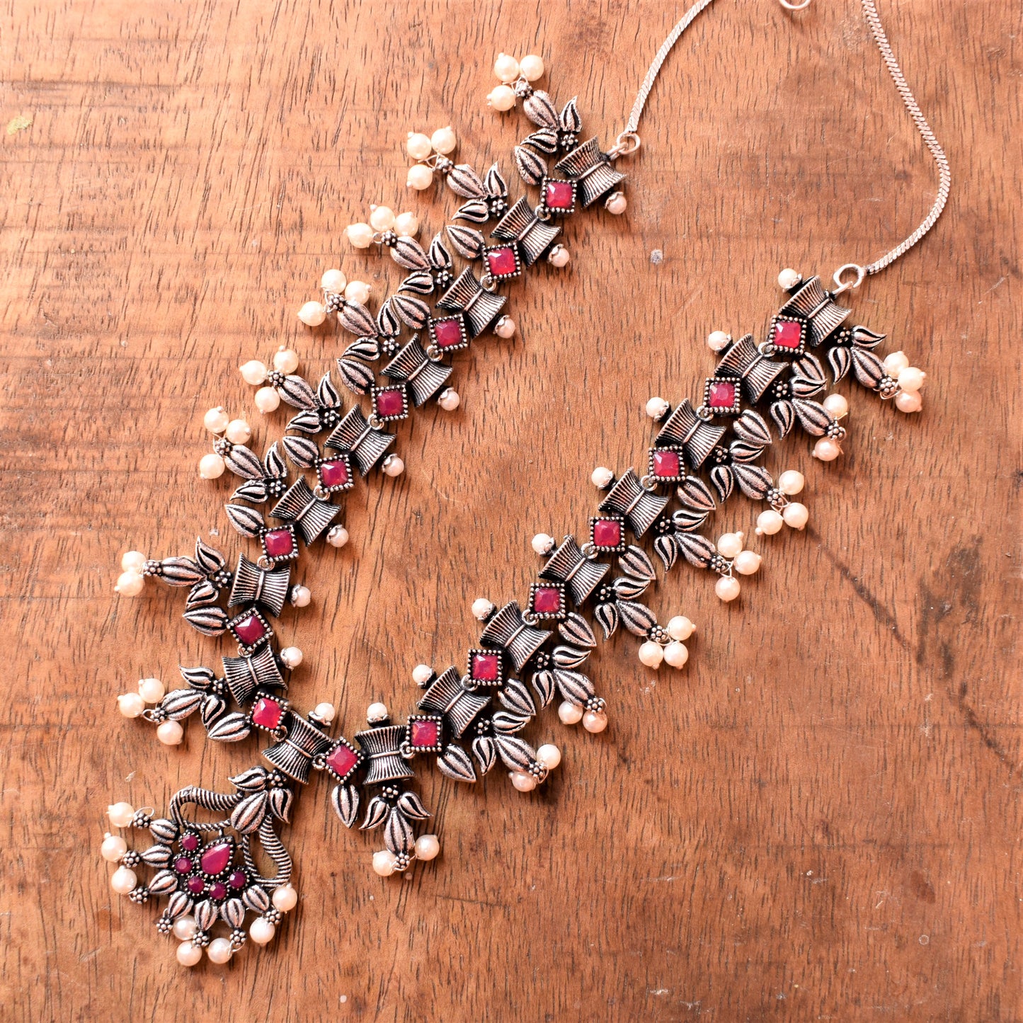 Designer Silver Necklace Set with Ruby and Pearl Embellishments