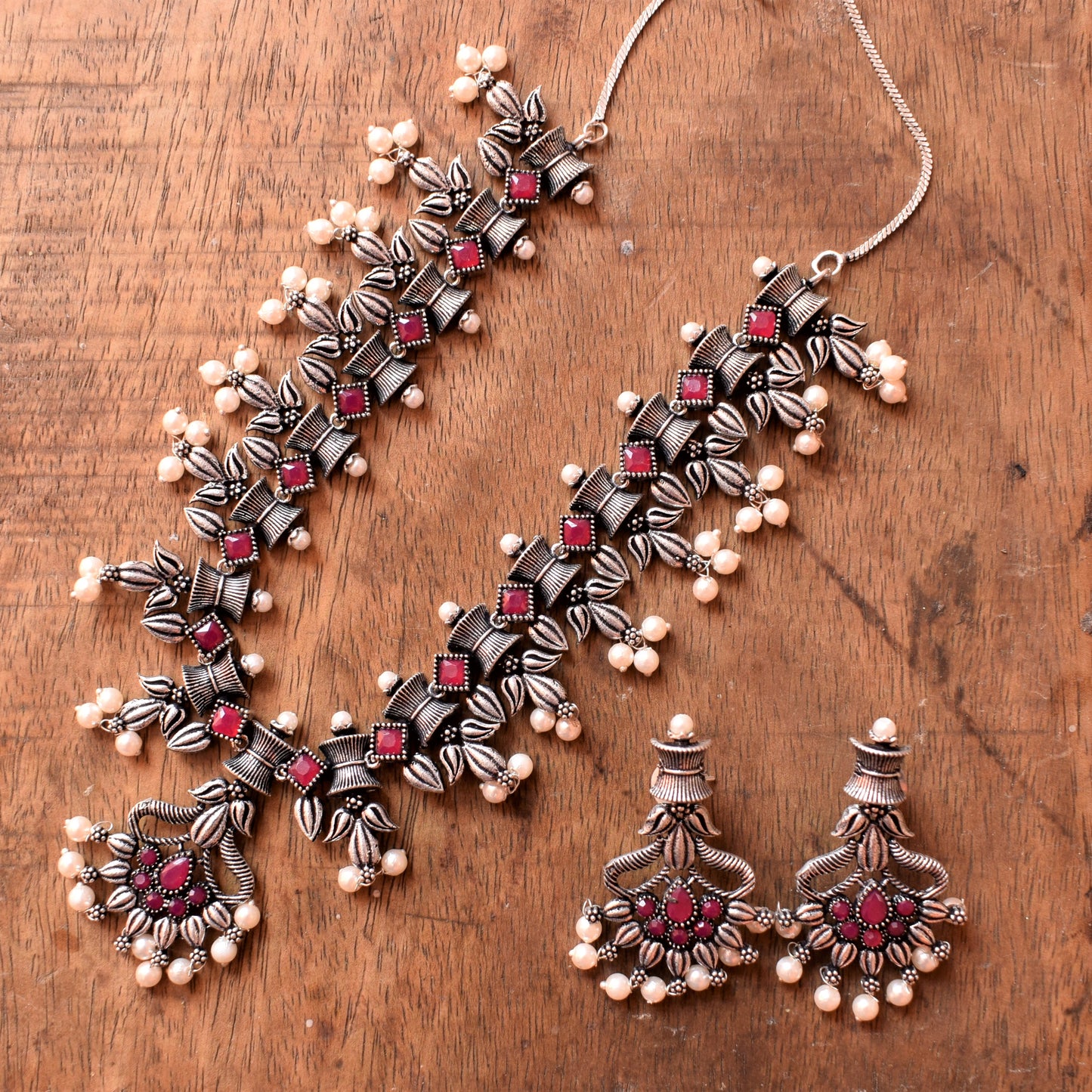 Designer Silver Necklace Set with Ruby and Pearl Embellishments