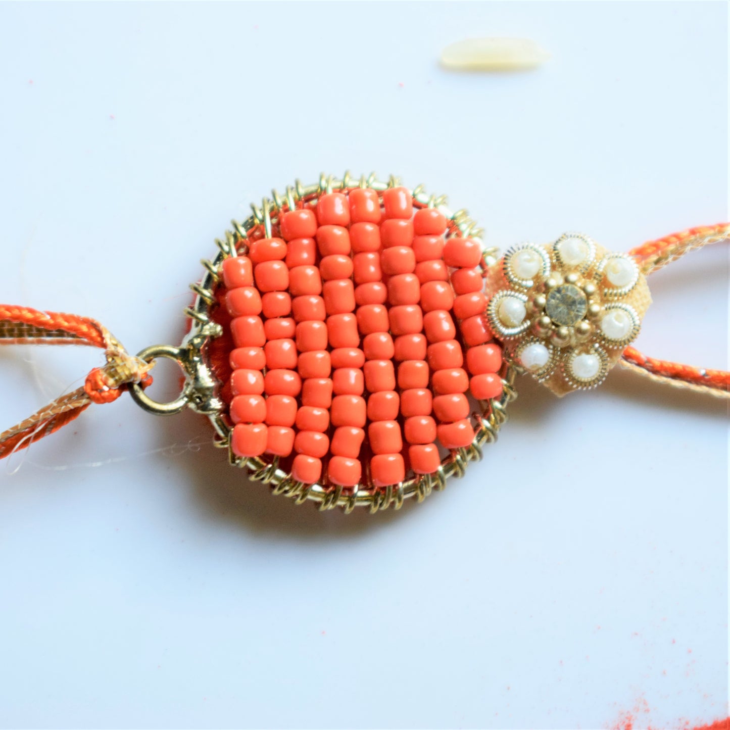 Orange Bloom Gota and Bead Rakhi