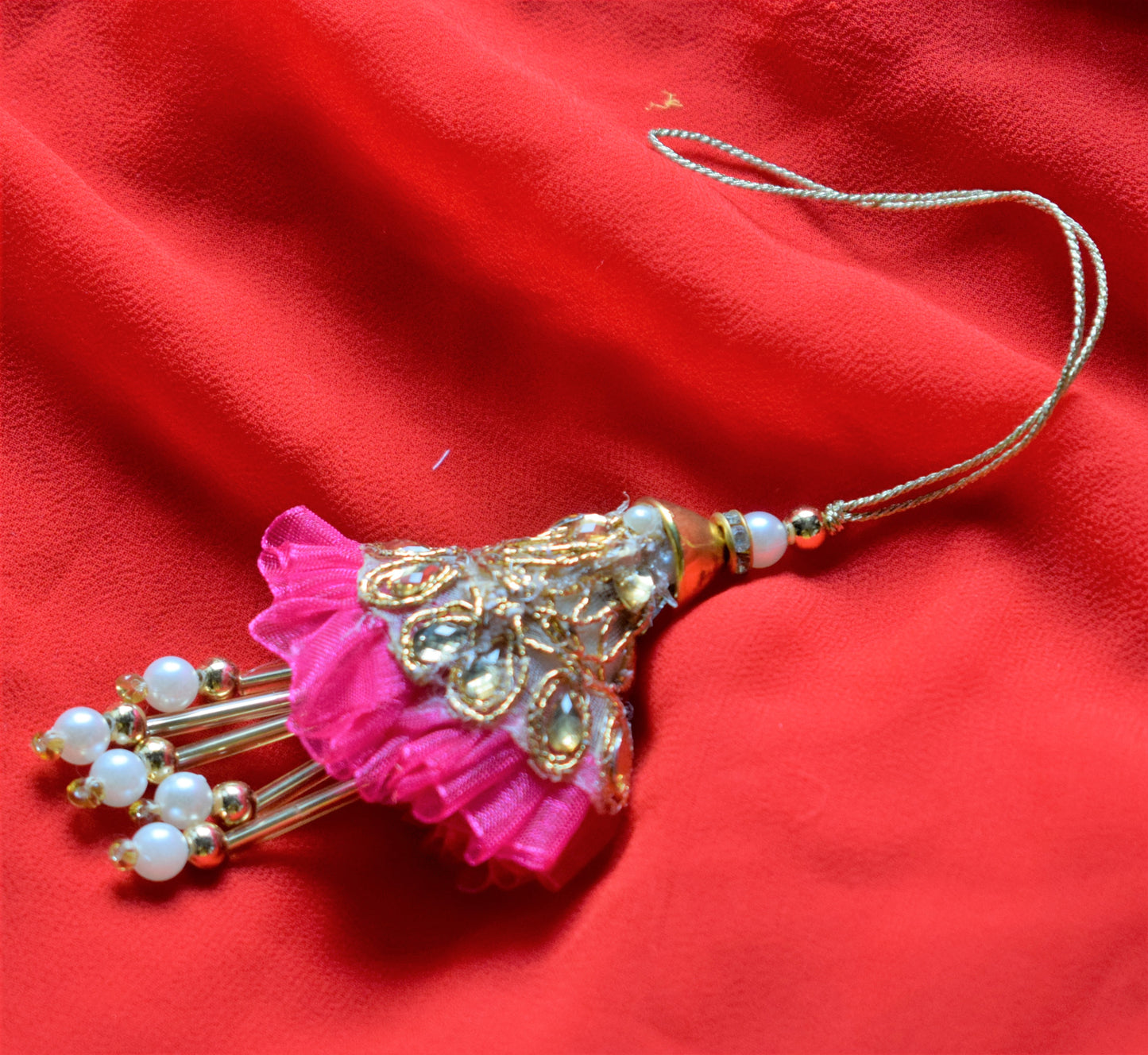 Kundan and Pearl Pastel Net Lumba Rakhi