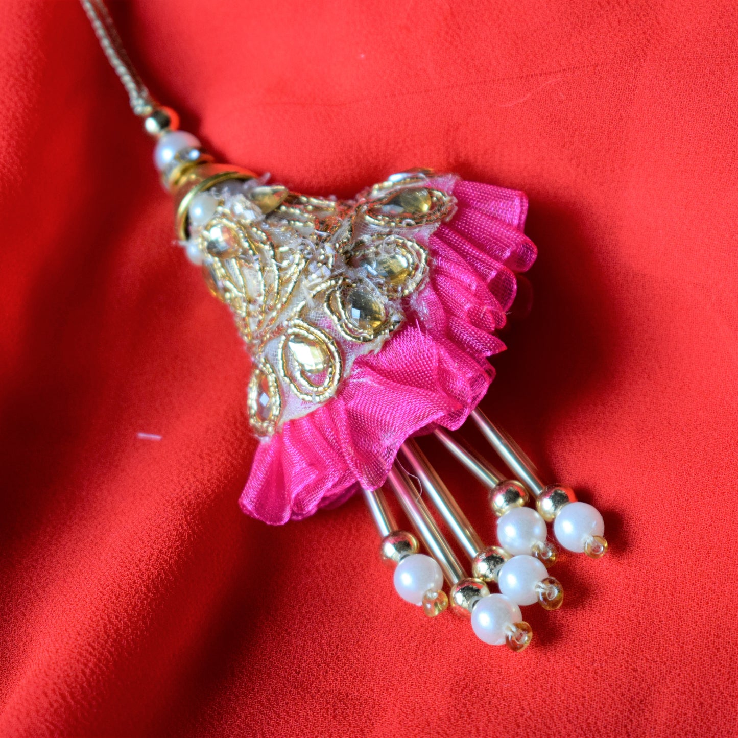 Kundan and Pearl Pastel Net Lumba Rakhi