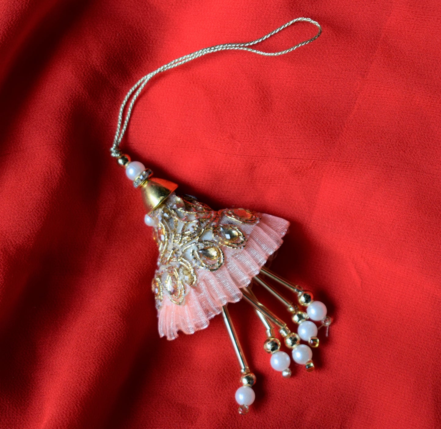 Kundan and Pearl Pastel Net Lumba Rakhi