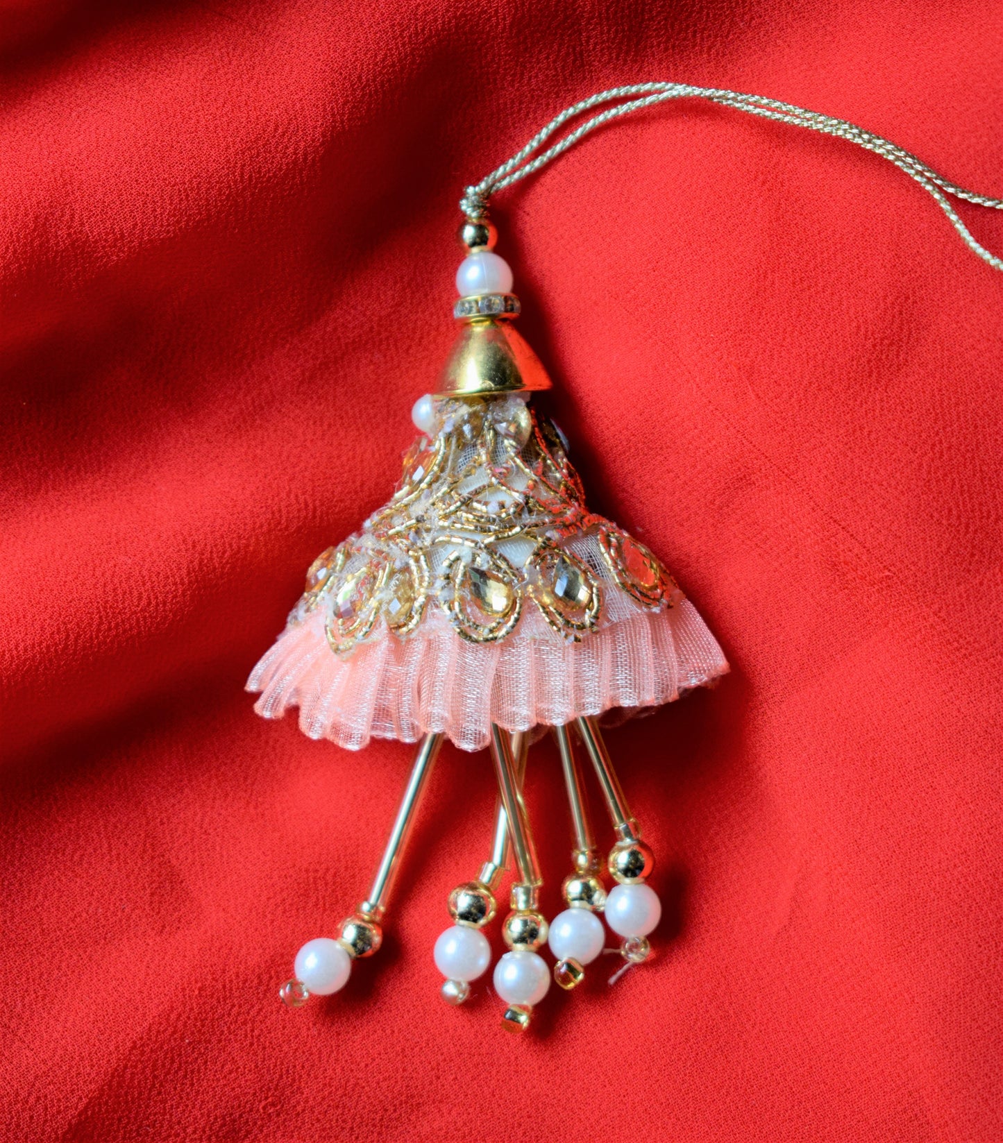 Kundan and Pearl Pastel Net Lumba Rakhi