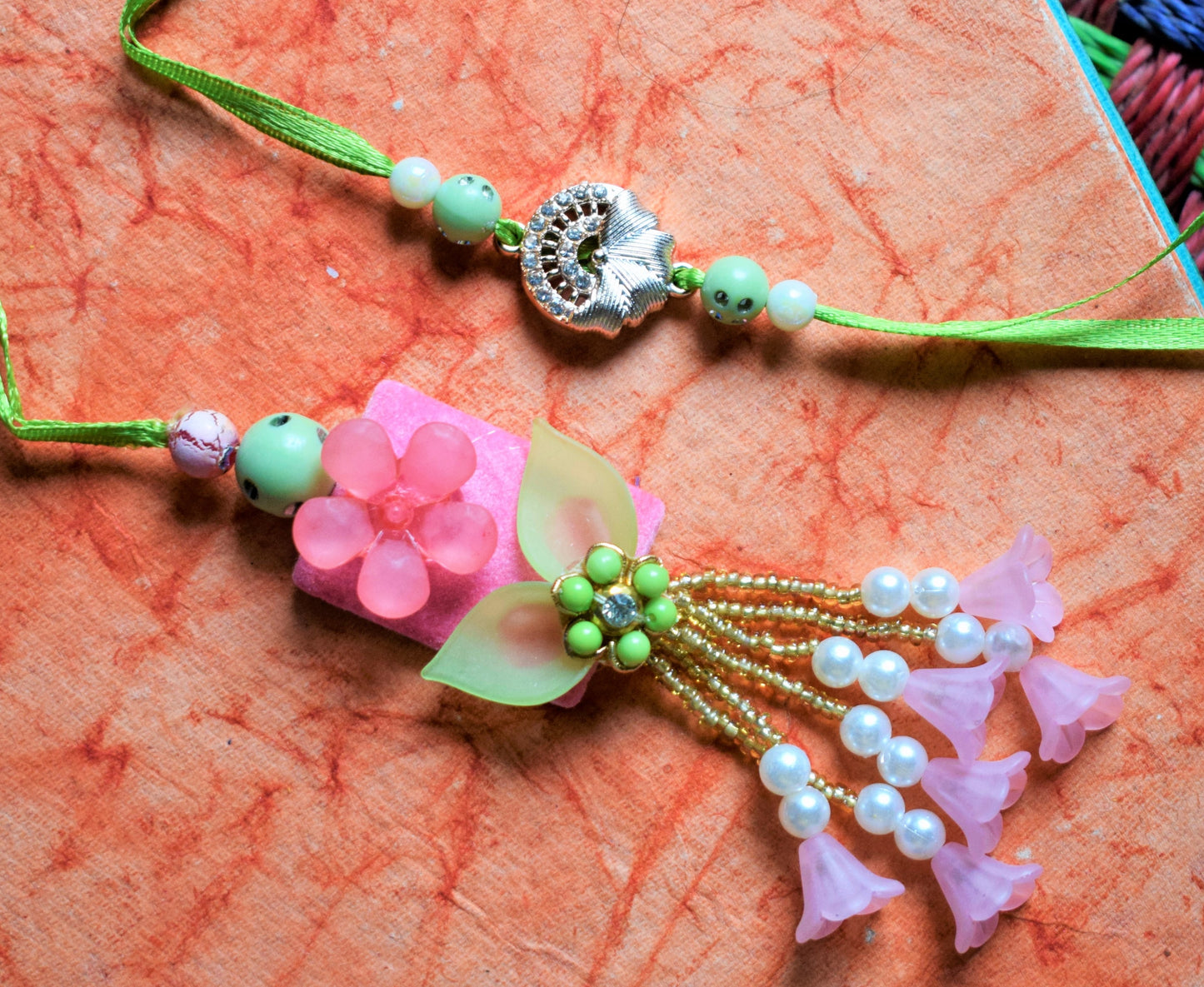 Floral Ecstasy Rakhi and Lumba Set (Pink and Green)