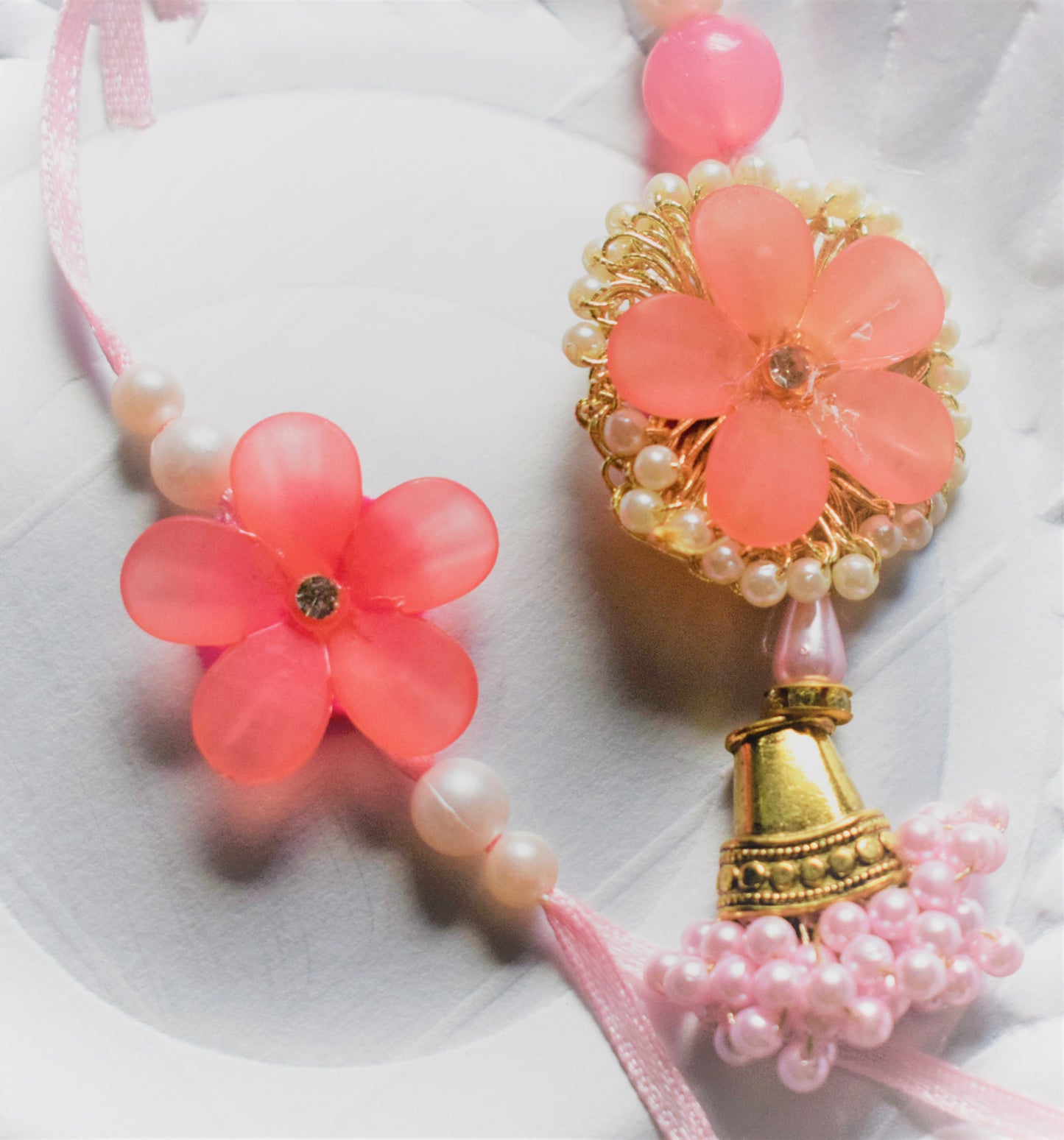 Flower and Bell Rakhi Lumba Set (Pink and Peach)