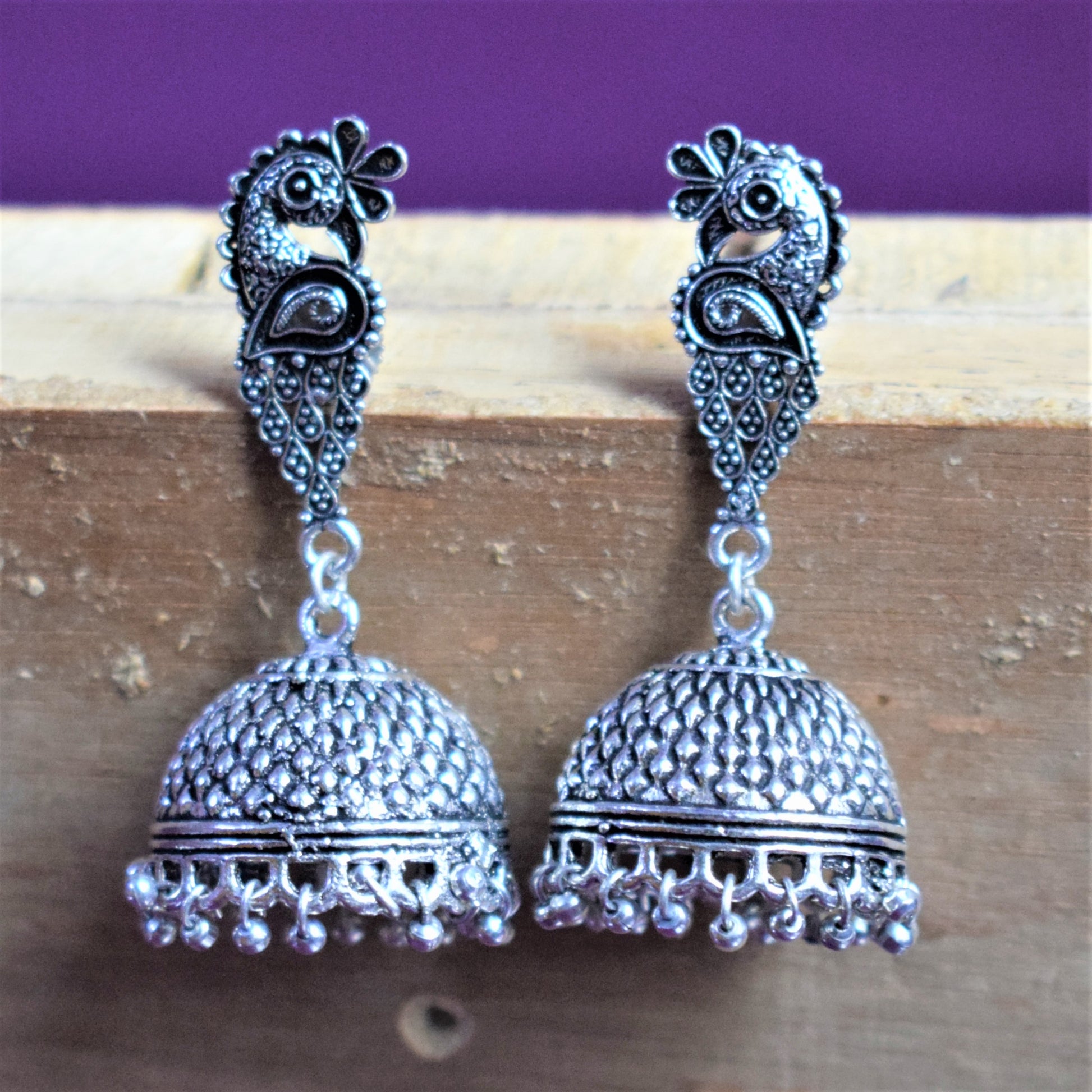 German Silver Angular Peacock Stud Carved Jhumka - GlitterGleam