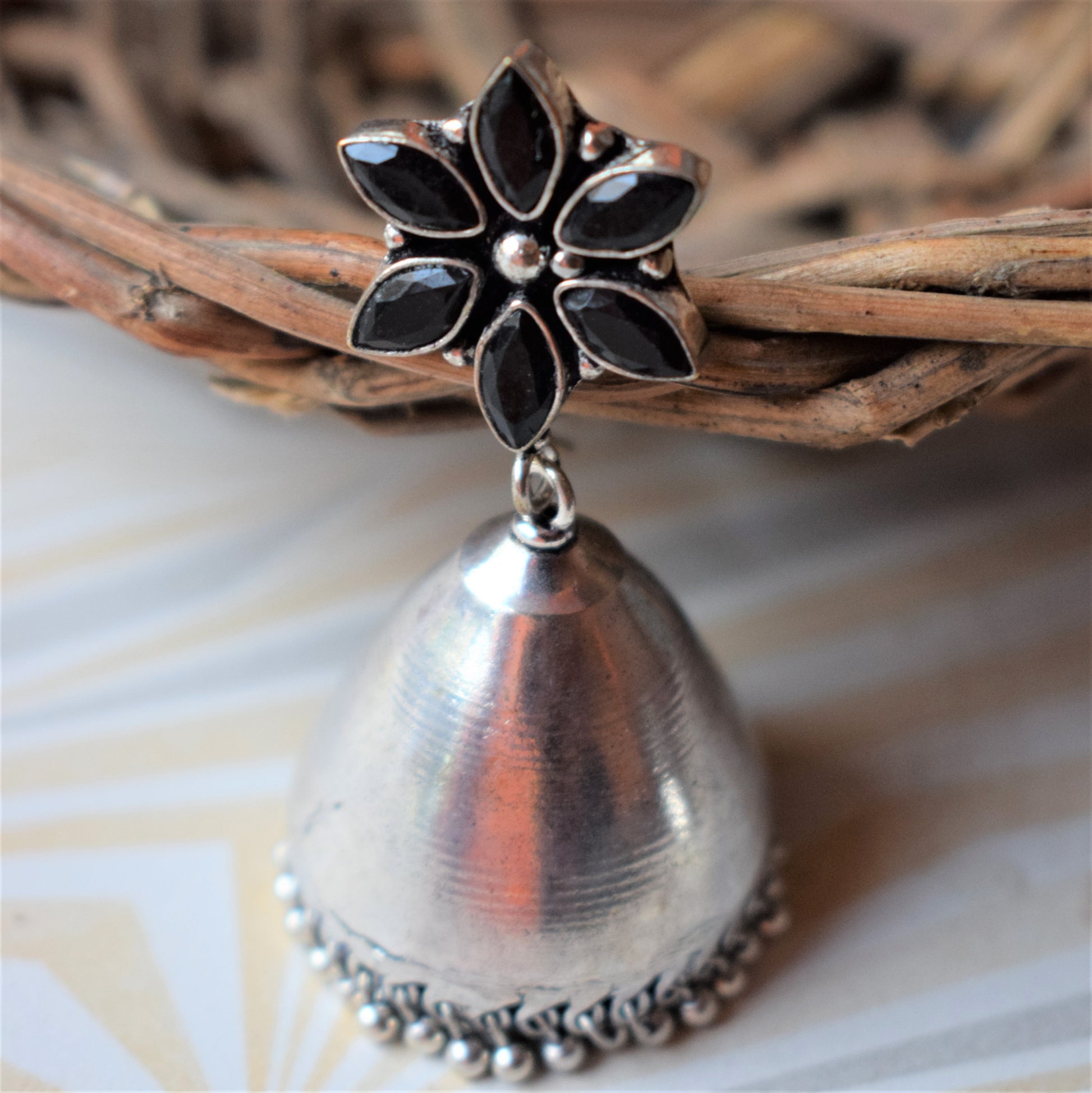 Designer Gemstone Flower Smooth German Silver Jhumka - GlitterGleam