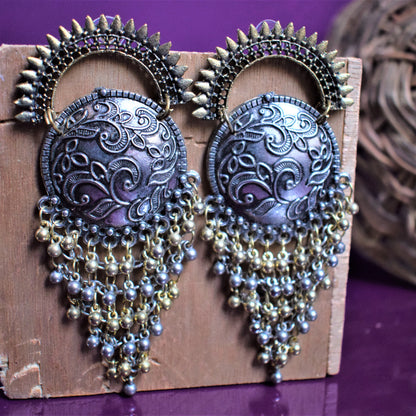 Designer Dual Tone Half Chakra Carved Earrings With Tassel - GlitterGleam