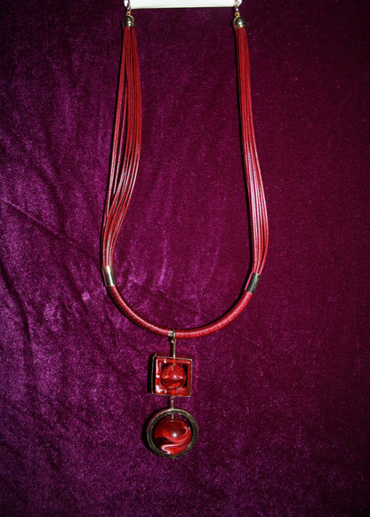 Rotating sphere leather string necklace - GlitterGleam