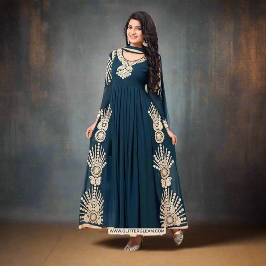 A woman wearing a teal colored pleated anarkali with golden embroidery, paired with a dupatta and normal salwar.